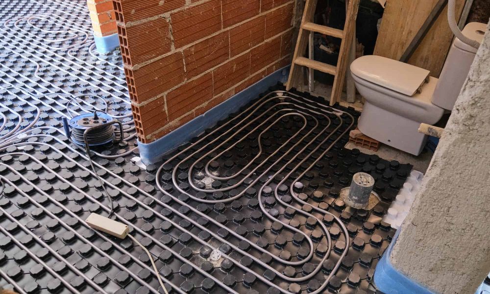 radiant-underfloor-heating-installation-in-a-bathroom-.jpg